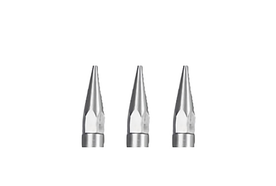 Spray tips for high viscosity fluids equipment